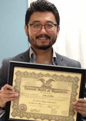 Luke Chao with his NGH certificate